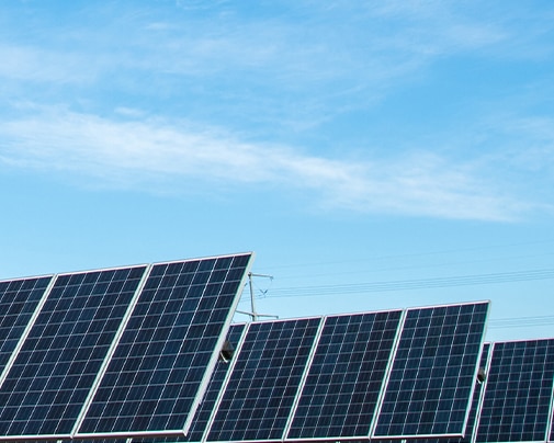 Solar panels against a blue sky